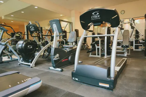 Fitness center with treadmills, bikes, and weight machines at Fiesta Americana Puerto Vallarta & Spa.