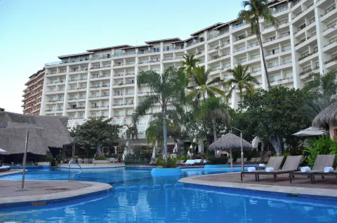 Pool and guestroom balconies at Fiesta Americana Puerto Vallarta & Spa.