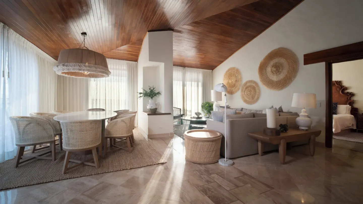 Suite dining and living area with wood ceiling at Fiesta Americana Puerto Vallarta & Spa.