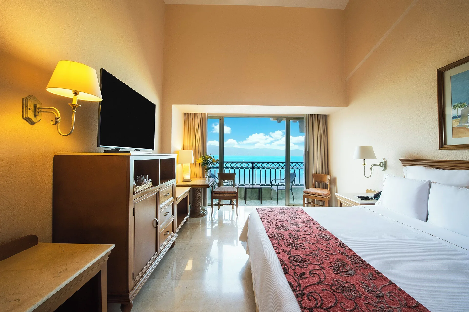 Club Room with king bed and ocean-facing balcony at Fiesta Americana Puerto Vallarta & Spa.
