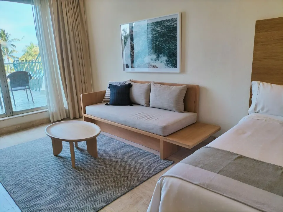 Family Room sitting area by the balcony at Fiesta Americana Puerto Vallarta & Spa.