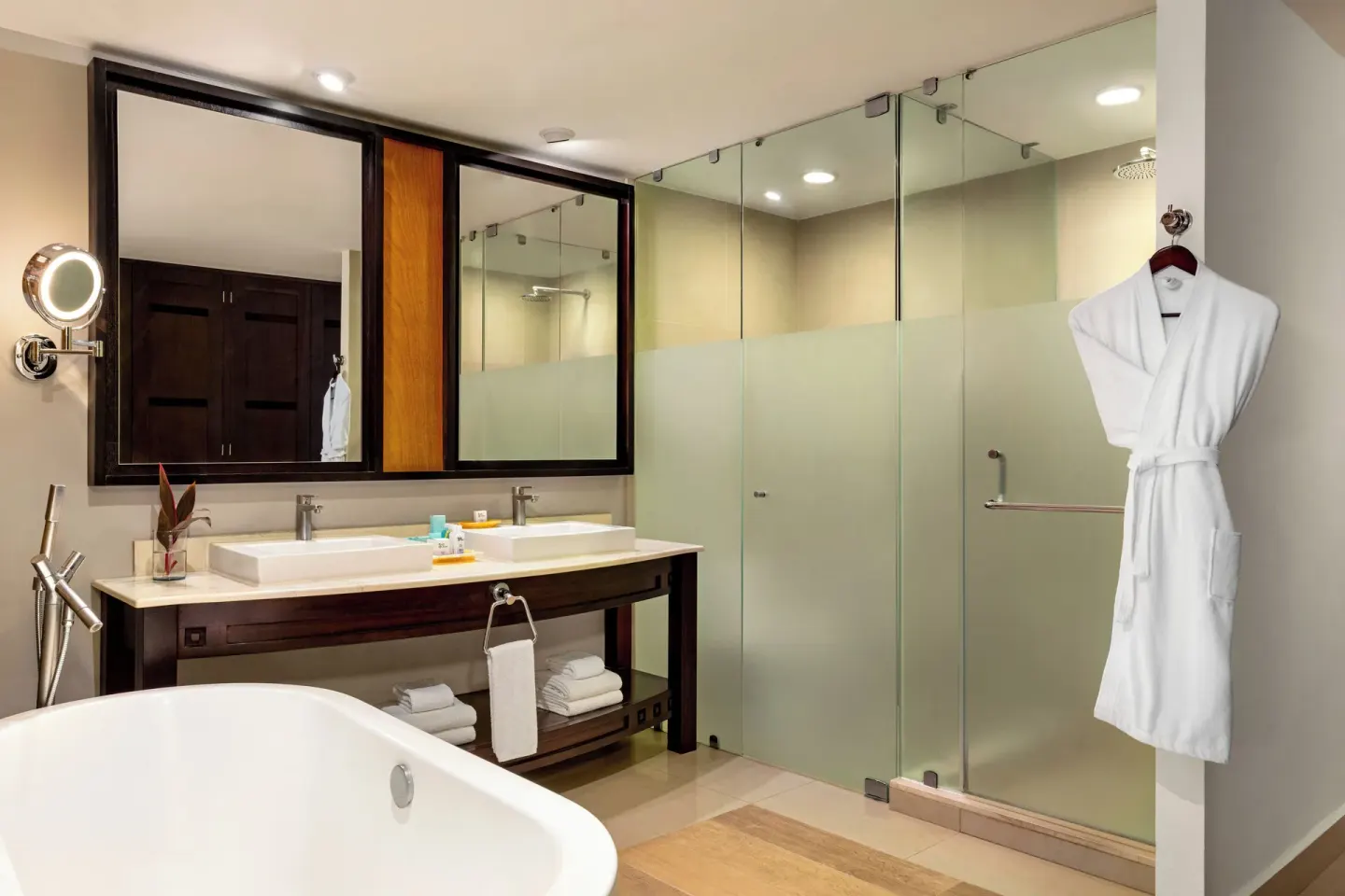 Bathroom with soaking tub and glass shower at Fiesta Americana Riviera Nayarit Resort & Spa.