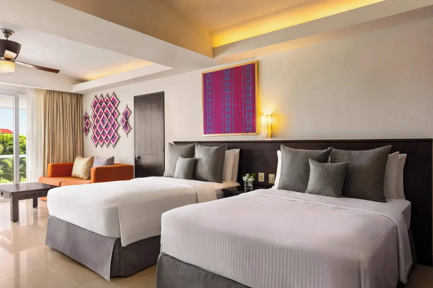Two queen beds in a guest room at Fiesta Americana Riviera Nayarit Resort & Spa.