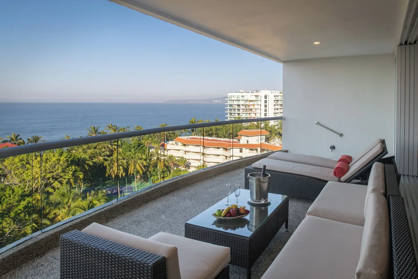 Large balcony lounge with ocean view at Fiesta Americana Riviera Nayarit Resort & Spa.