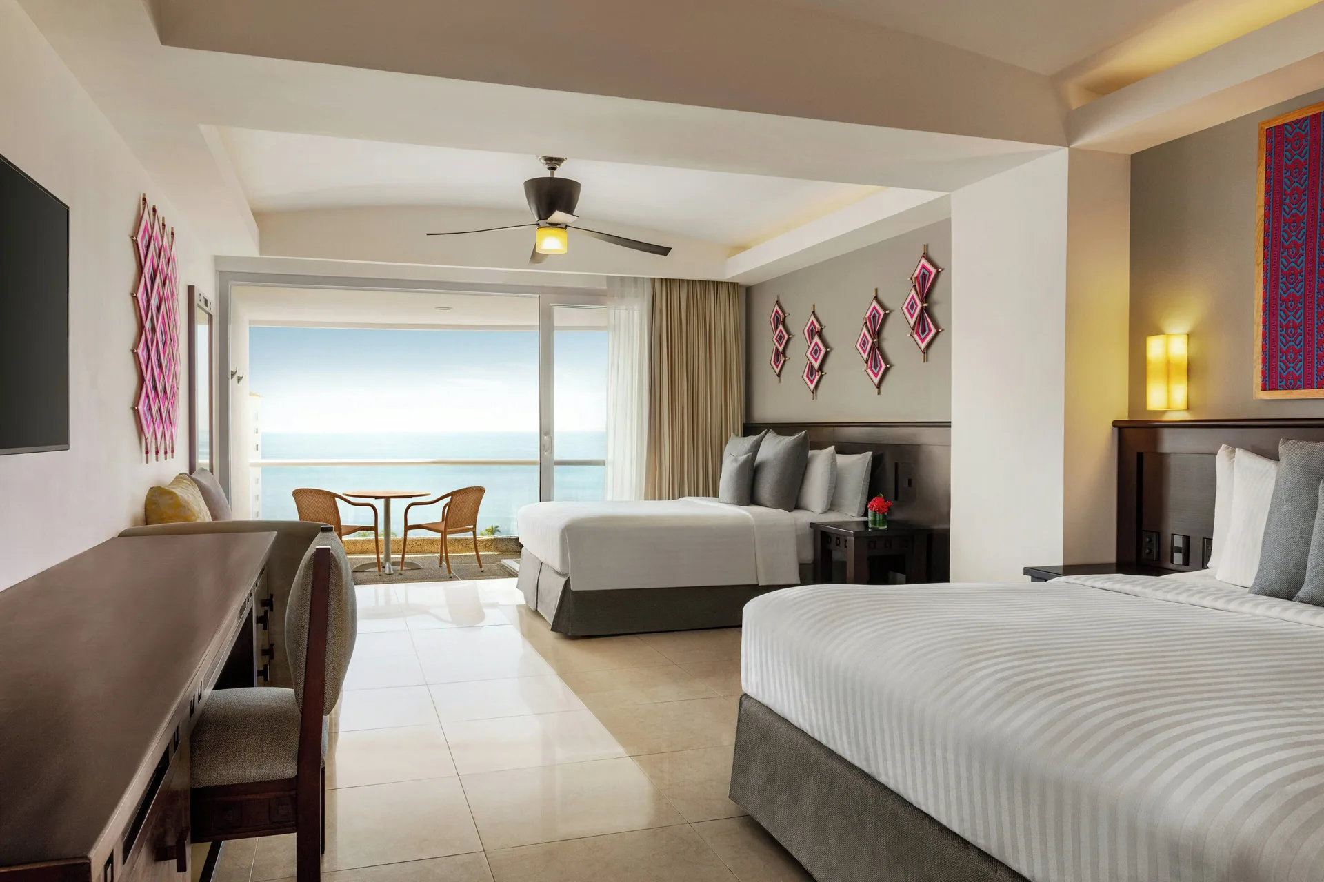 Junior Suite Ocean View beds and desk at Fiesta Americana Riviera Nayarit Resort & Spa.