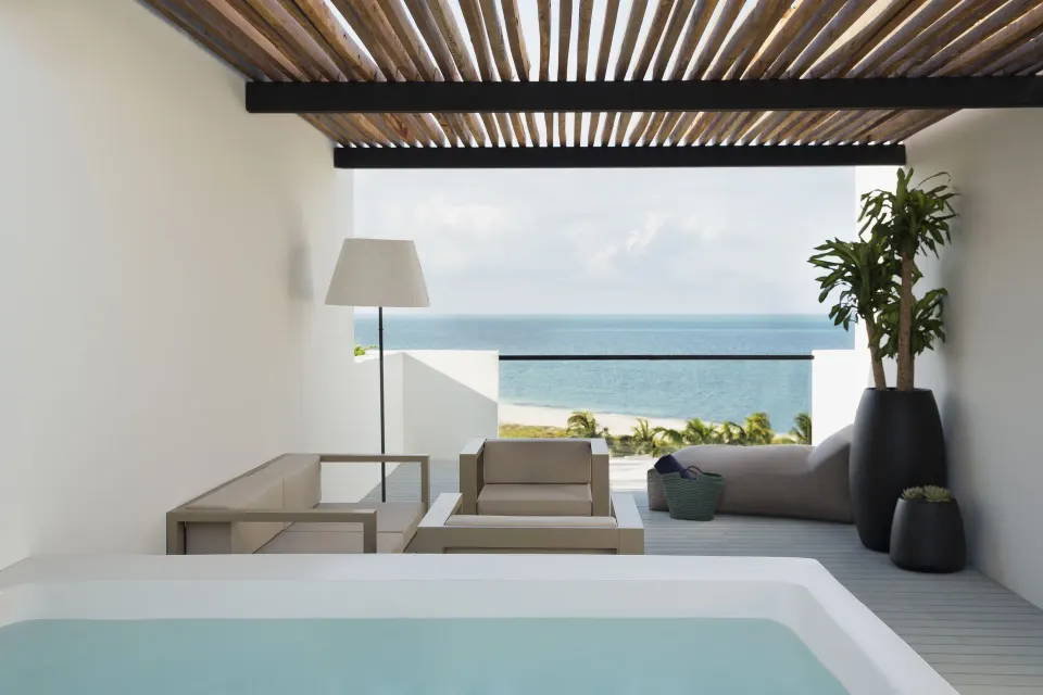 Rooftop terrace plunge pool and ocean view in a suite at Finest Playa Mujeres.
