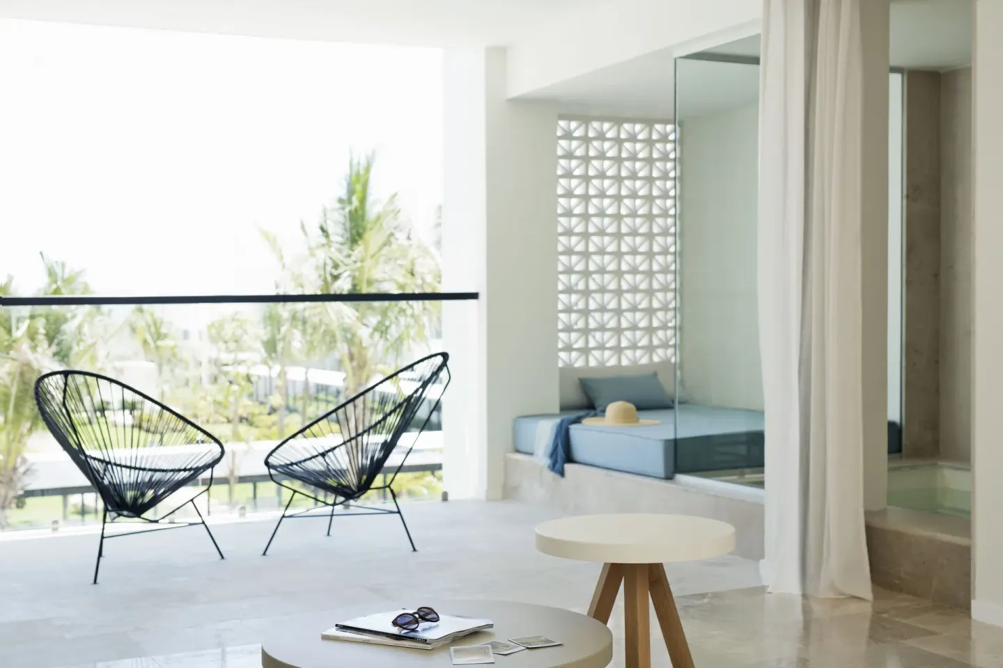Junior Suite Spa or Pool View balcony seating and soaking tub at Finest Playa Mujeres.
