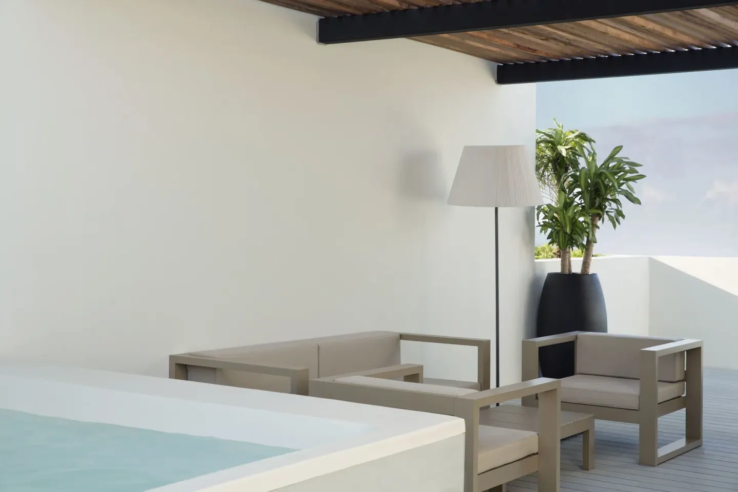 Rooftop terrace plunge pool and lounge seating in a suite at Finest Playa Mujeres.