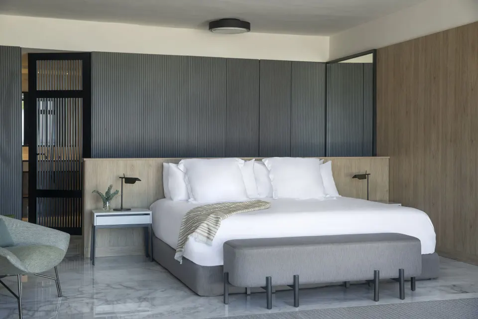 Excellence Club Imperial Suite king bed and bench at Finest Punta Cana