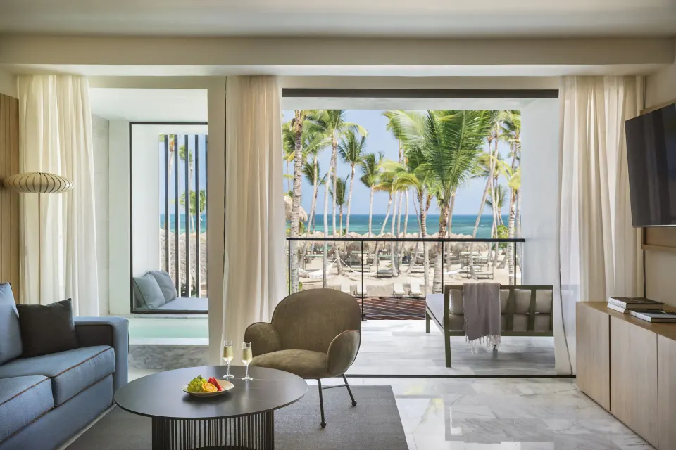 Finest Punta Cana living area with balcony ocean view at Finest Punta Cana.
