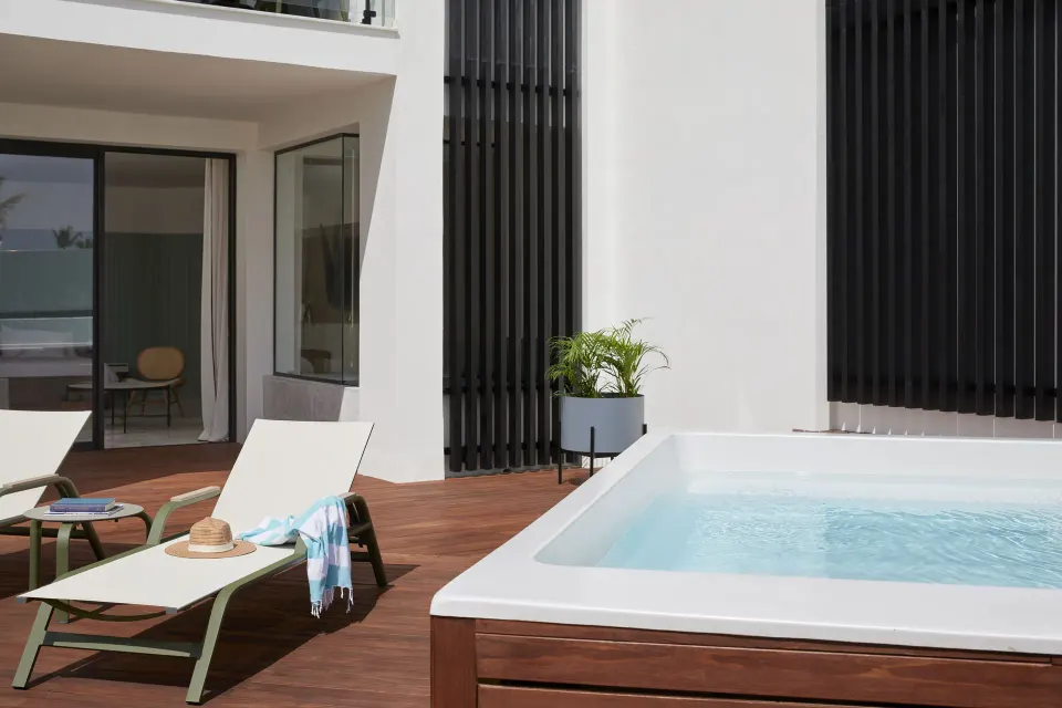 Private plunge pool and loungers on a Terrace Suite deck at Finest Punta Cana.
