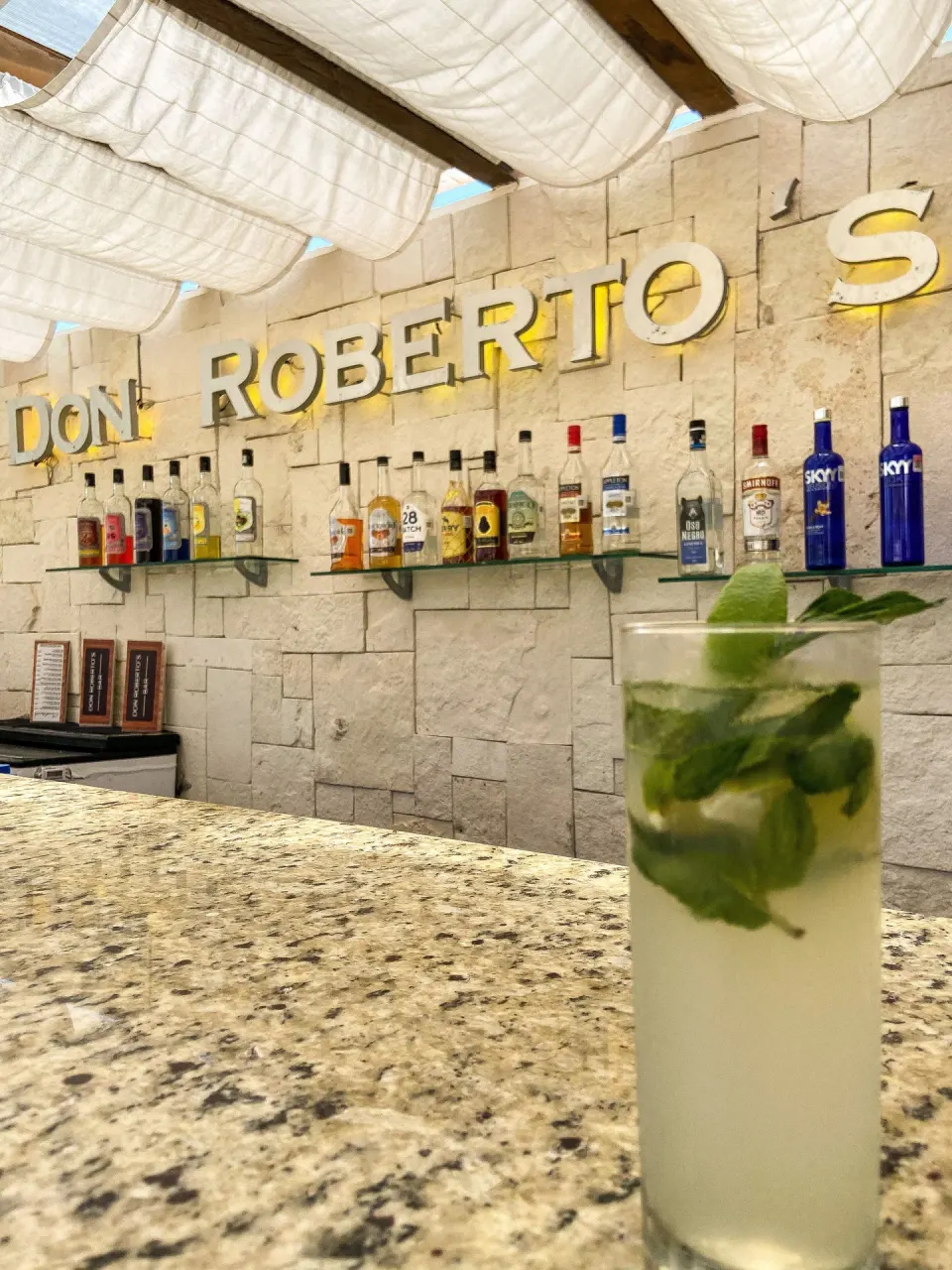 Cocktail on the counter at Don Robertos Bar & Pizza at Flamingo Cancun.