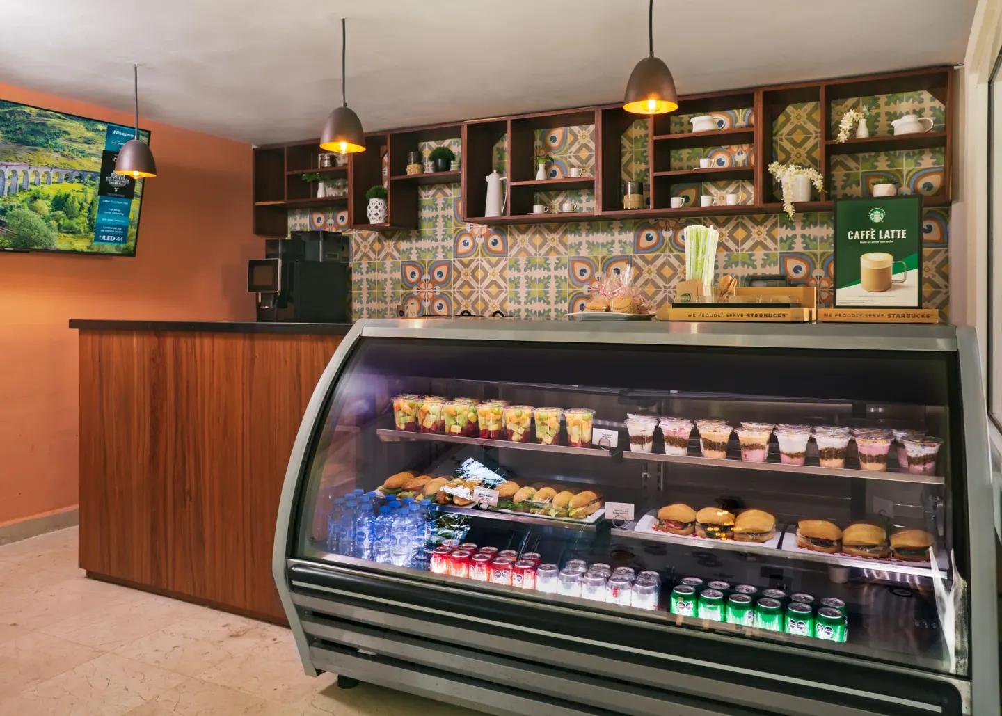 Cafe counter with refrigerated snacks and drinks at Flamingo Cancun.