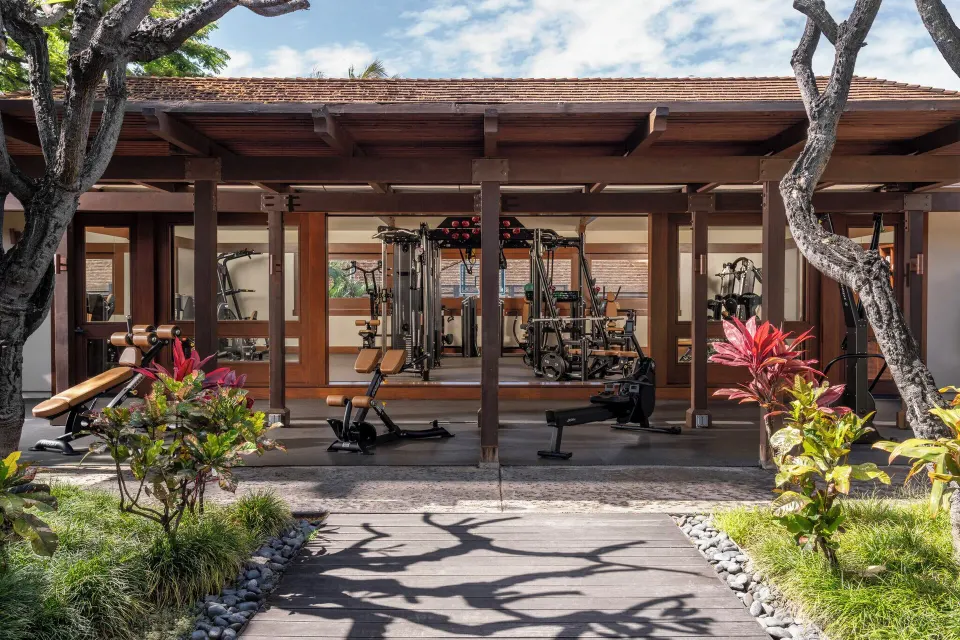 Open-air gym with strength equipment at Four Seasons Resort Hualalai.