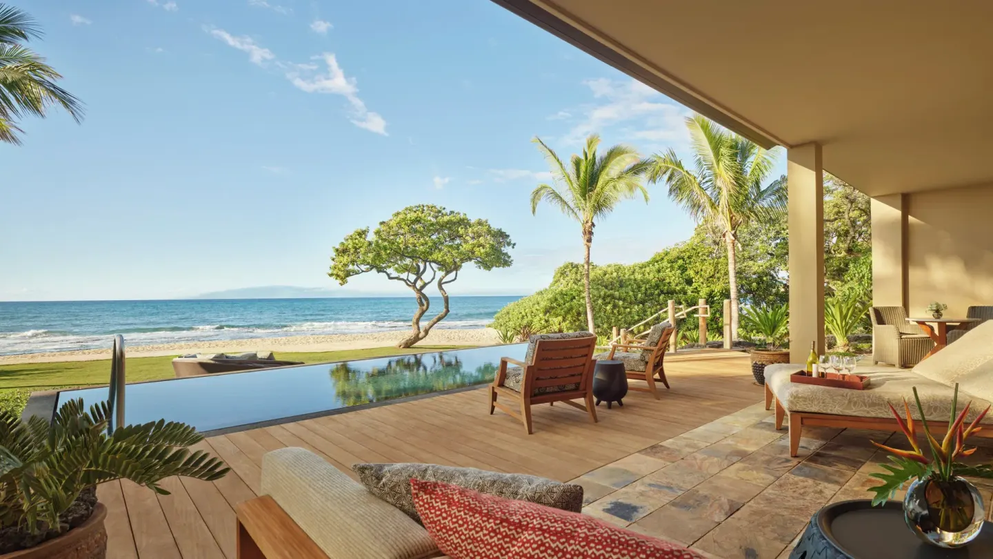 Private oceanfront terrace with infinity pool at Four Seasons Resort Hualalai.