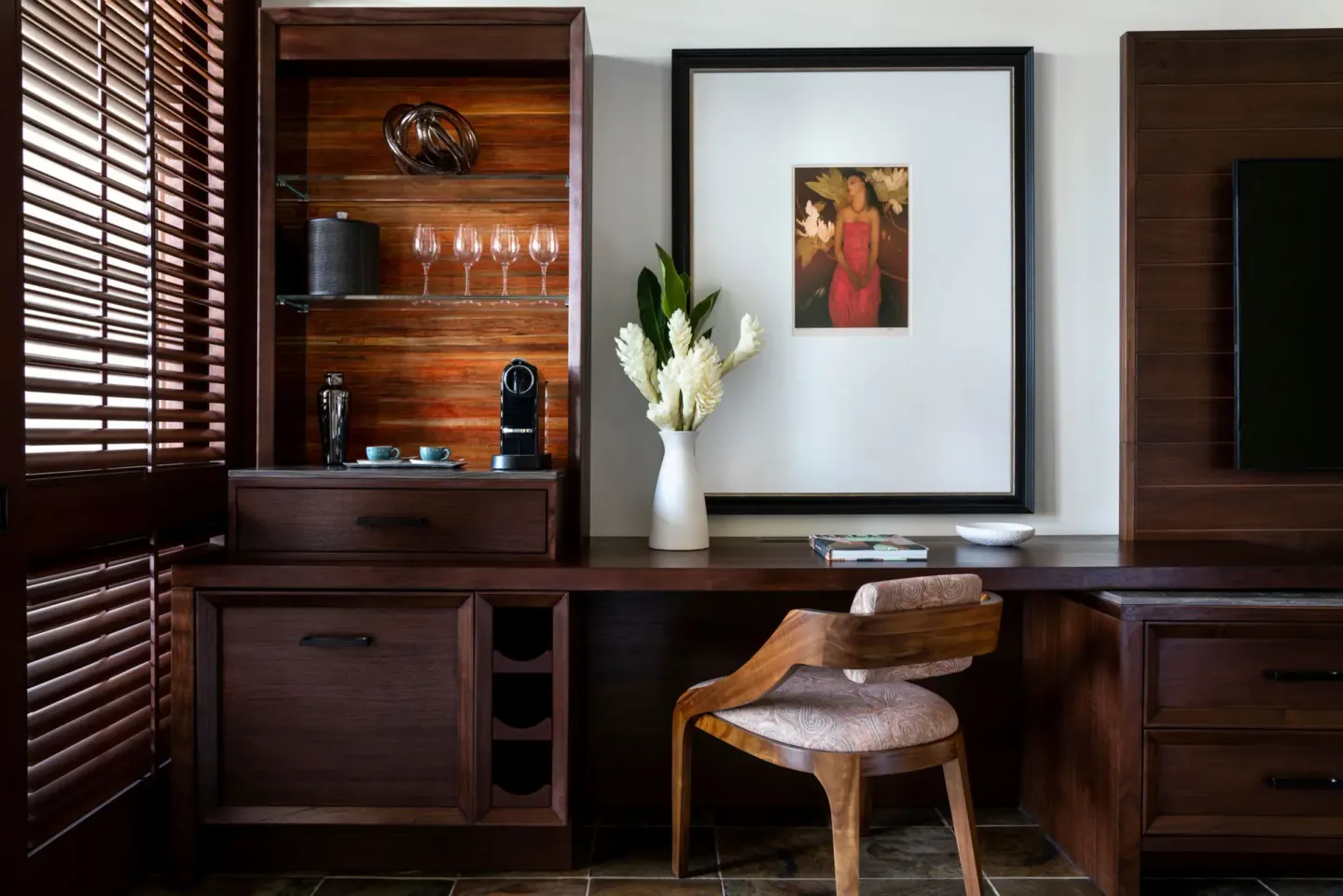 Deluxe Room refreshment cabinet and desk at Four Seasons Resort Hualalai.