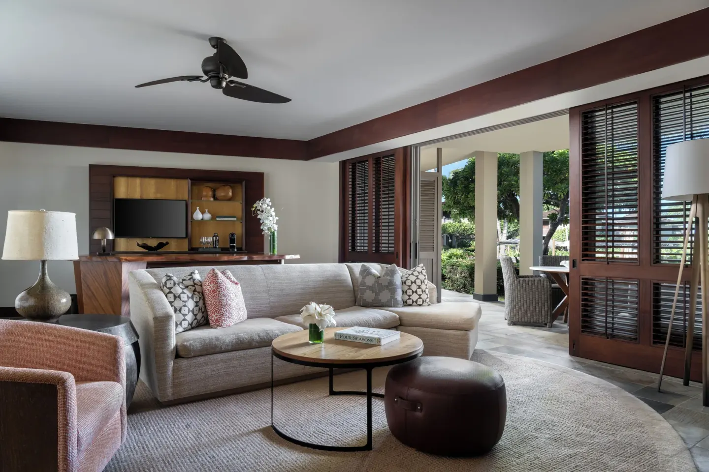 Deluxe Room living area with sofa bed at Four Seasons Resort Hualalai.