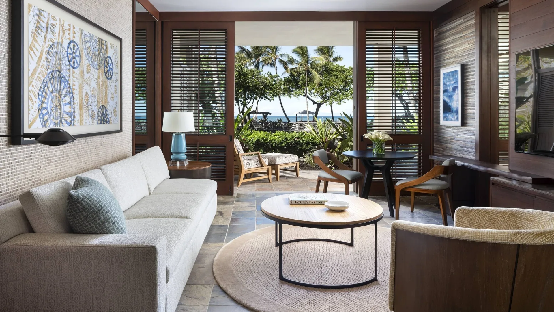 Superior Suite ocean view living room with lanai at Four Seasons Resort Hualalai.