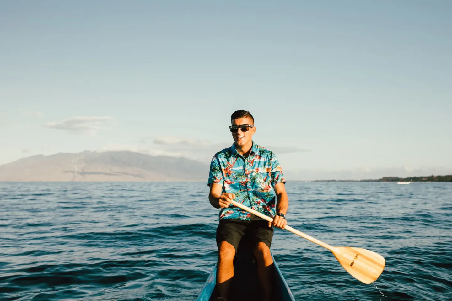 A canoe paddler crosses the ocean near Four Seasons Resort Maui at Wailea.