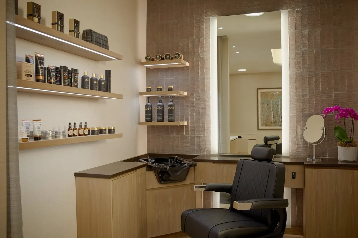 Salon styling chair and product shelves at Four Seasons Resort Maui at Wailea.