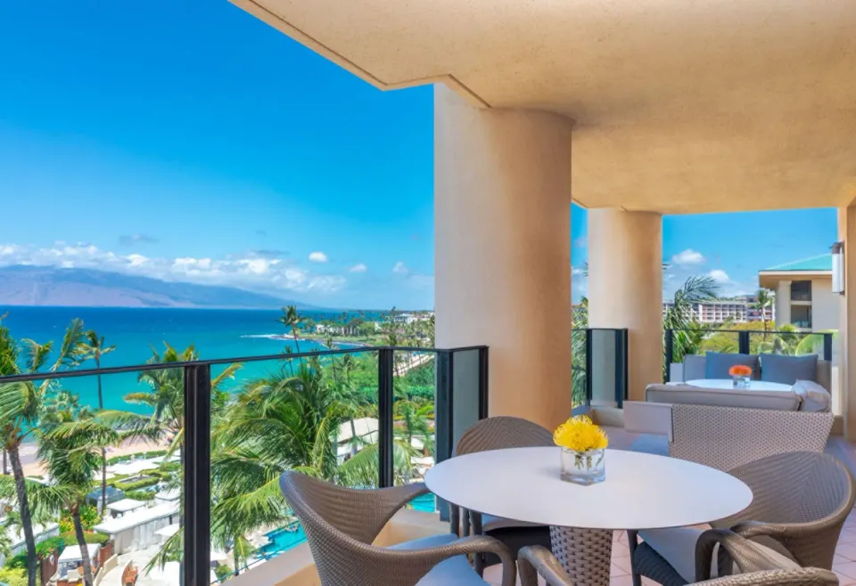 Club Ocean Front One Bedroom Suite terrace dining area at Four Seasons Resort Maui at Wailea.