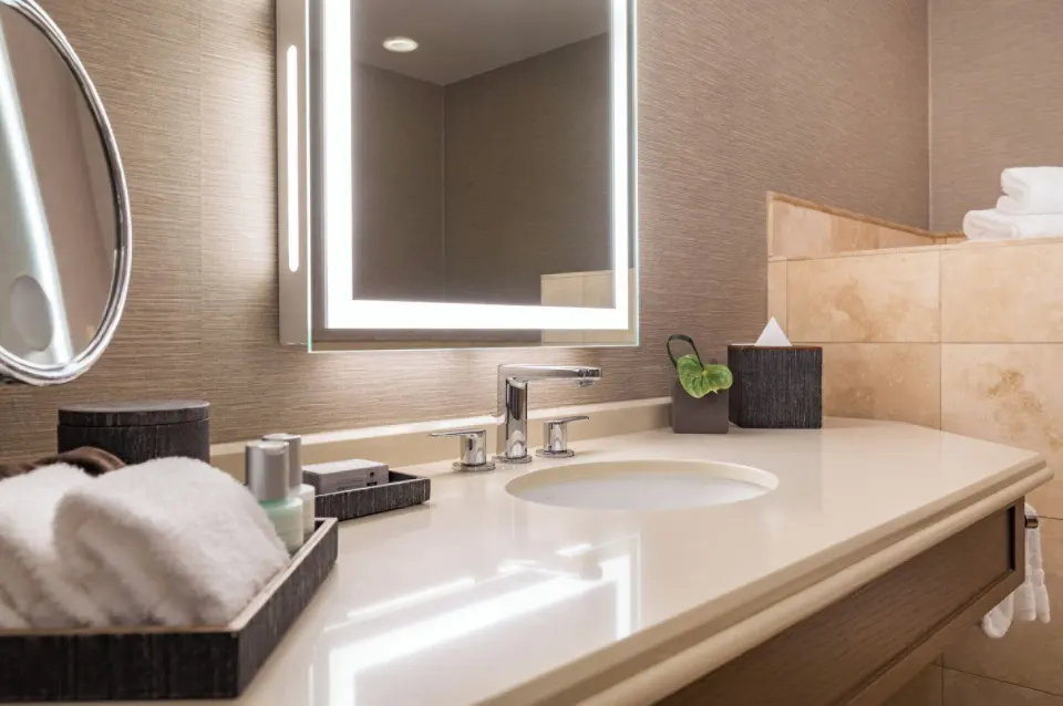Bathroom vanity in a Deluxe Garden View Executive Suite at Four Seasons Resort Maui at Wailea.