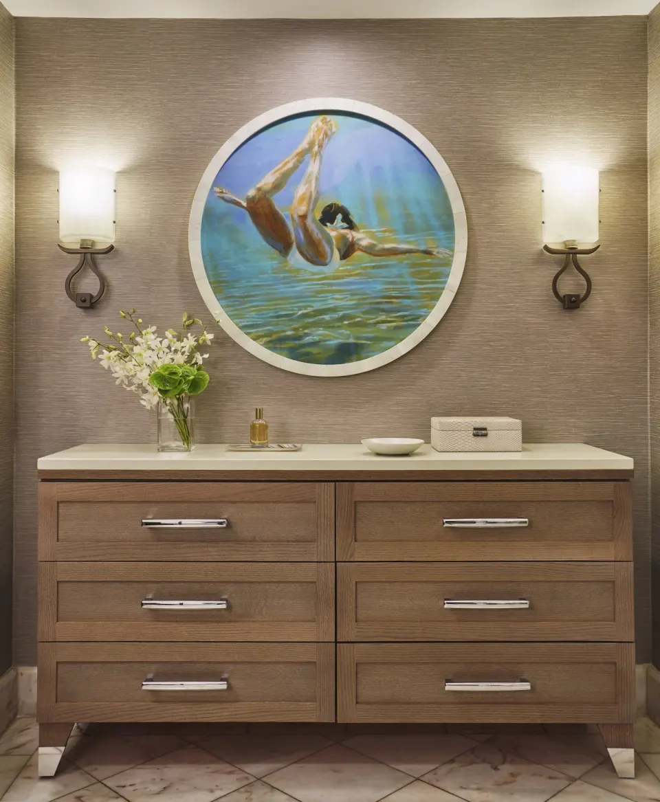Garden View Accessible Room dresser at Four Seasons Resort Maui at Wailea with wall sconces and round artwork.