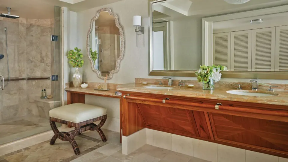 Lokelani Presidential Suite bathroom vanity and shower at Four Seasons Resort Maui at Wailea.