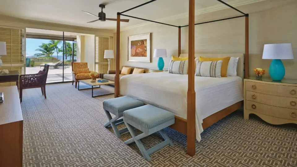 Lokelani Presidential Suite bedroom with ocean-facing terrace at Four Seasons Resort Maui at Wailea.