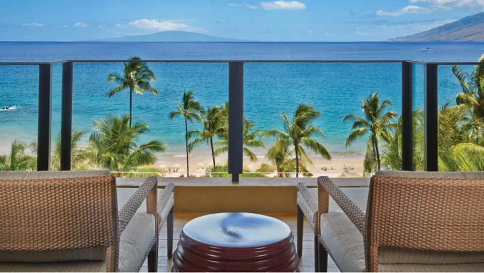 Maile Presidential Suite balcony seating with ocean view at Four Seasons Resort Maui at Wailea.