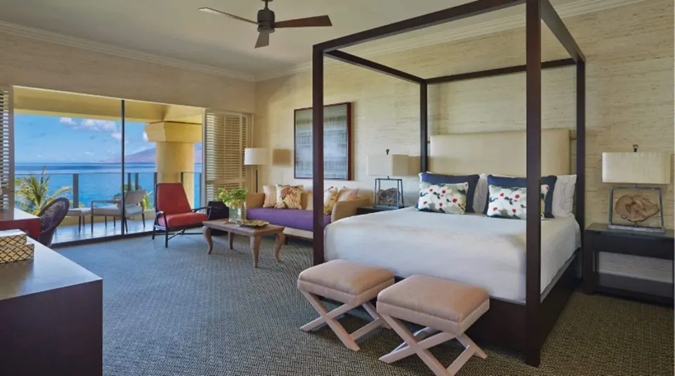 Maile Presidential Suite canopy king bedroom with ocean view at Four Seasons Resort Maui at Wailea.