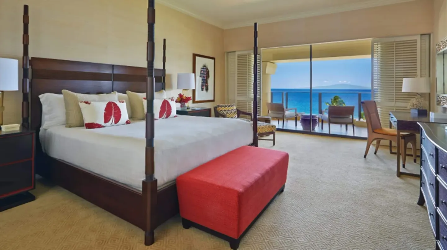 Maile Presidential Suite king bedroom with ocean lanai at Four Seasons Resort Maui at Wailea.
