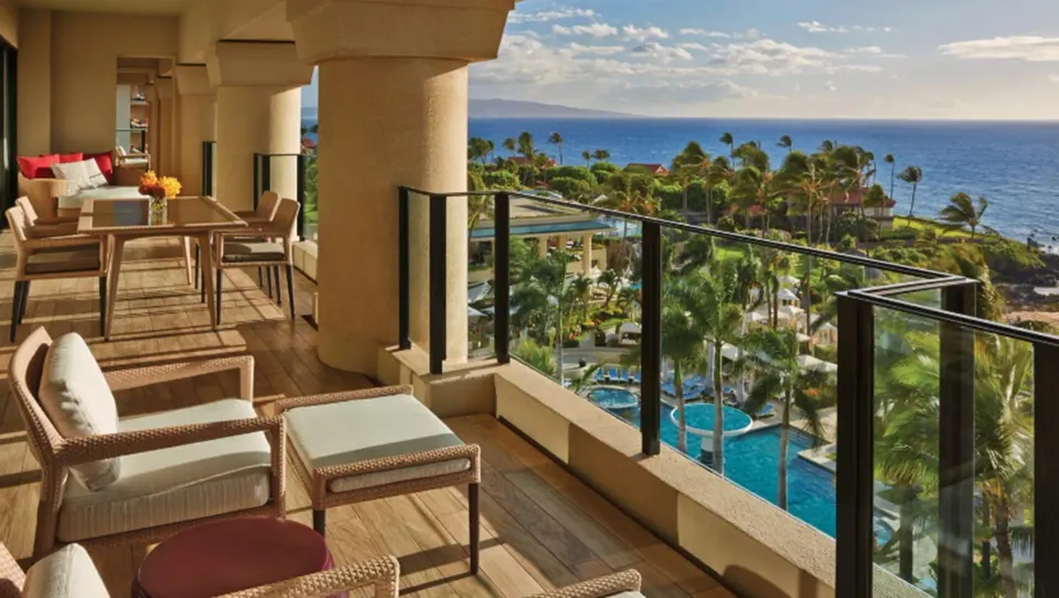 Maile Presidential Suite terrace dining and pool view at Four Seasons Resort Maui at Wailea.