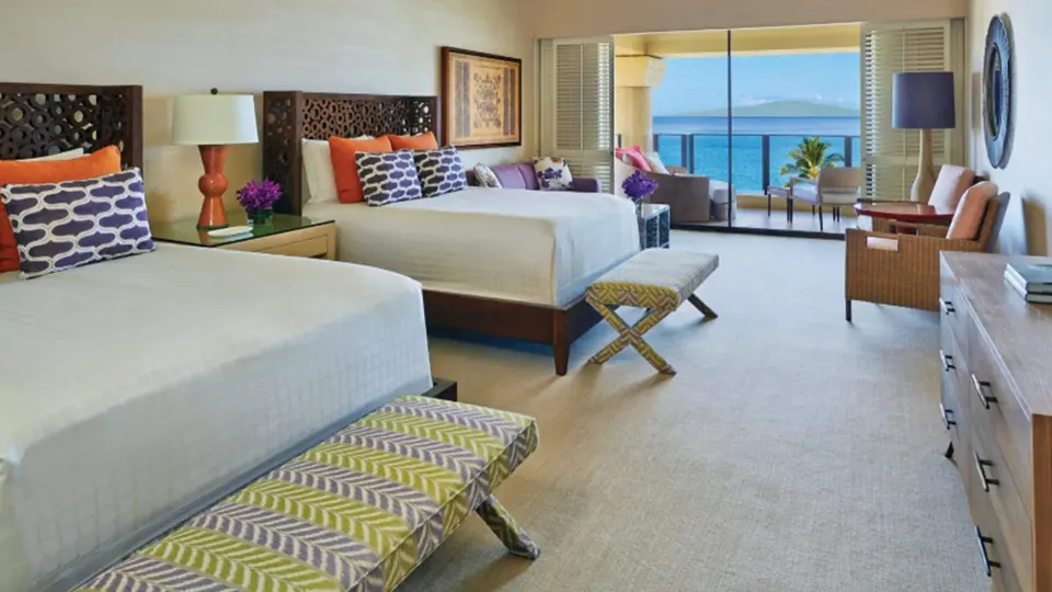Maile Presidential Suite two-bed bedroom with ocean balcony at Four Seasons Resort Maui at Wailea.