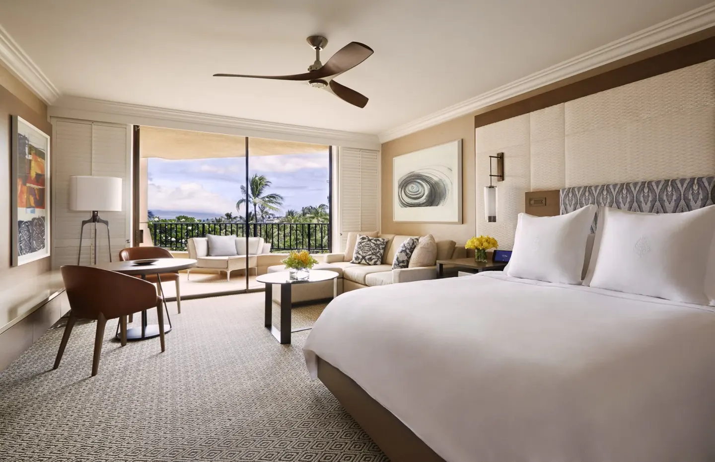 Ocean View Room with king bed and balcony at Four Seasons Resort Maui at Wailea.