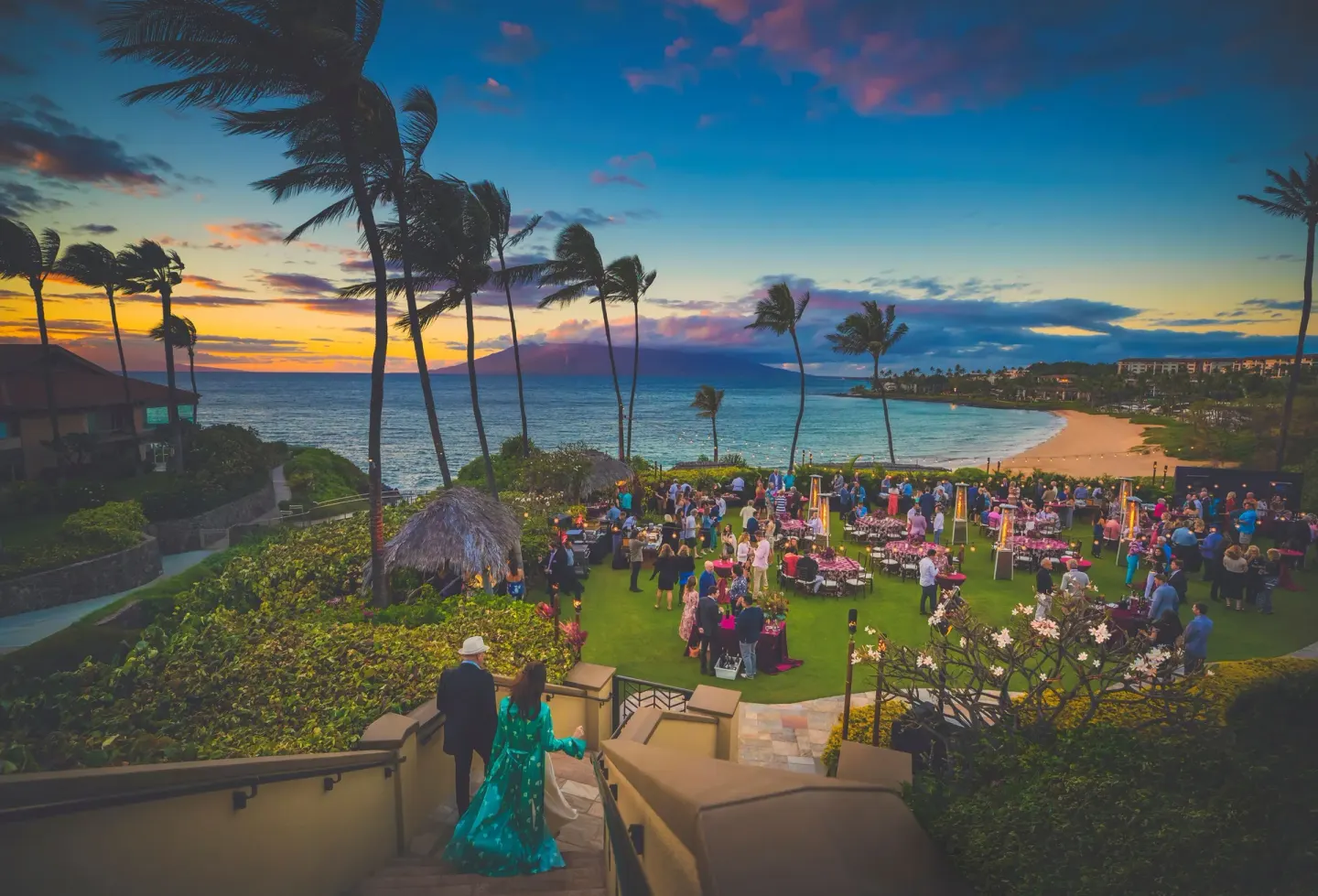 Beachfront lawn event at sunset at Four Seasons Resort Maui at Wailea.