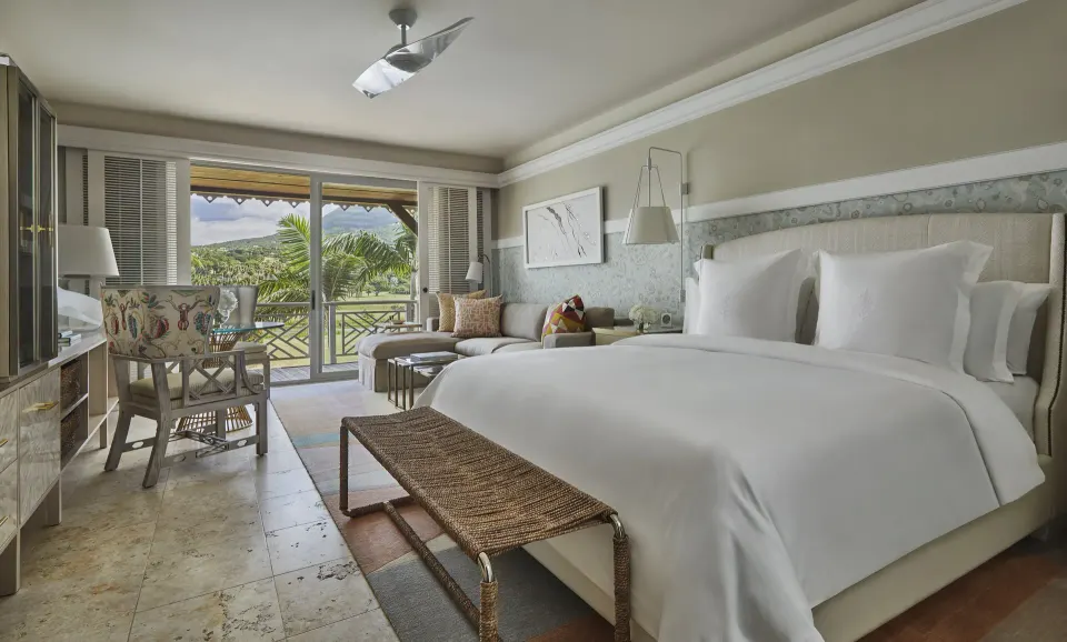 Nevis Peak View room king bed and balcony view at Four Seasons Resort Nevis.