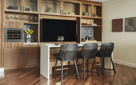 Guest room bar and media wall at Four Seasons Resort Oahu at Ko Olina.