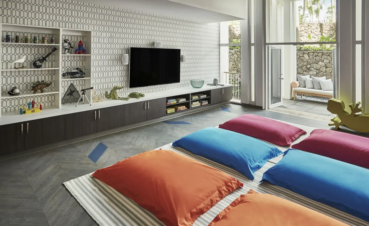 Colorful kids club playroom with floor cushions at Four Seasons Resort Oahu at Ko Olina.