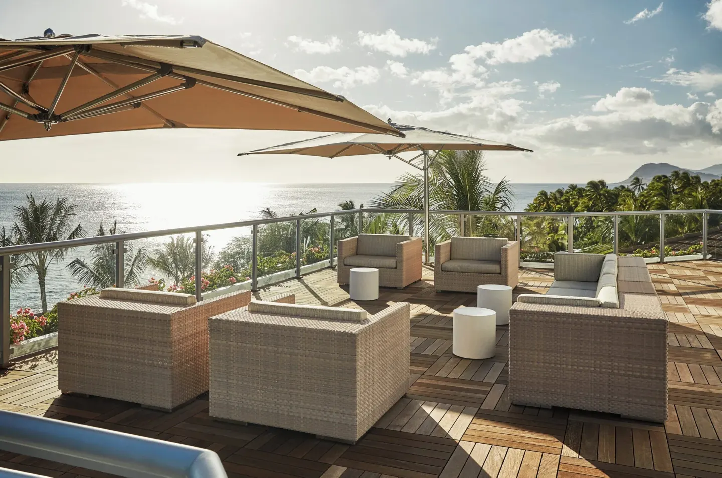 Ocean-view terrace seating at Four Seasons Resort Oahu at Ko Olina.