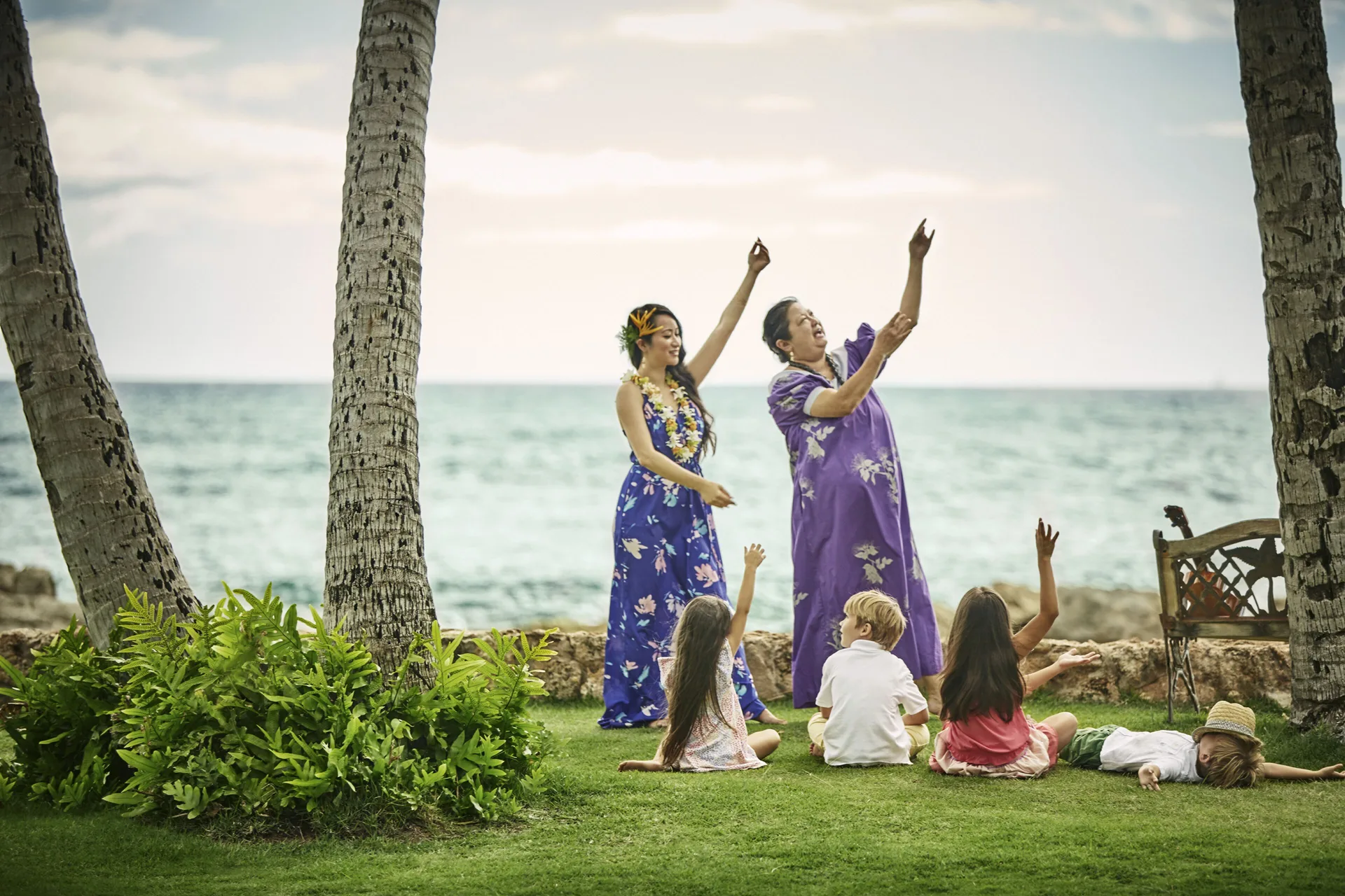 Hula lesson for children on the lawn at Four Seasons Resort Oahu at Ko Olina.