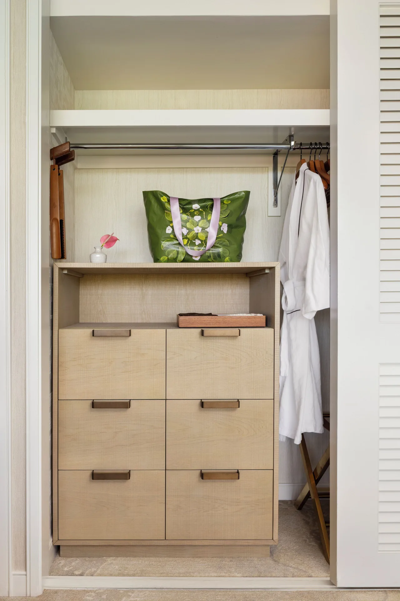 Club Partial Ocean Room closet with drawers and robes at Four Seasons Resort Oahu at Ko Olina.