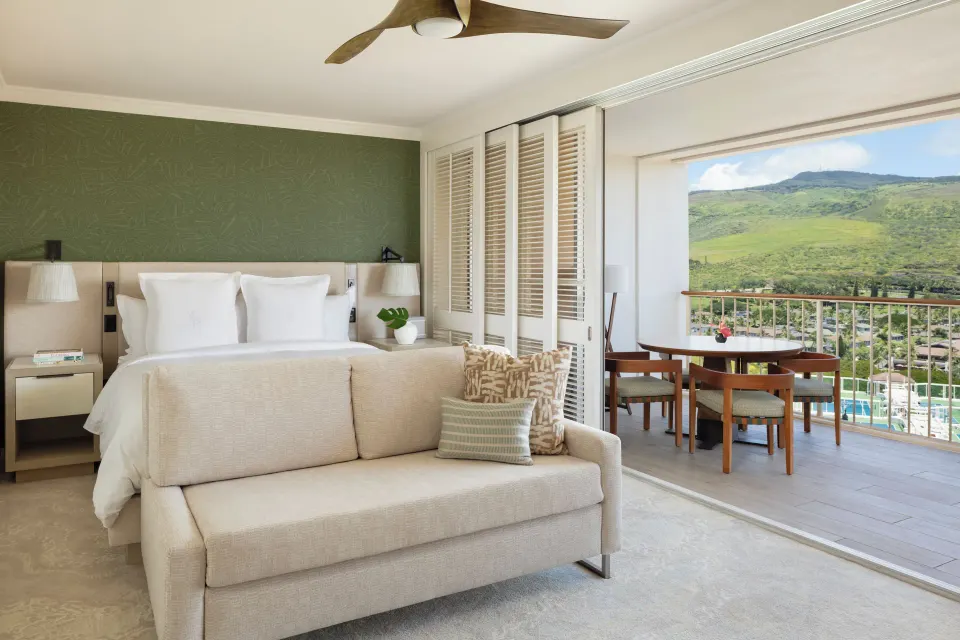 Club Resort Room with king bed, sofa and balcony at Four Seasons Resort Oahu at Ko Olina.