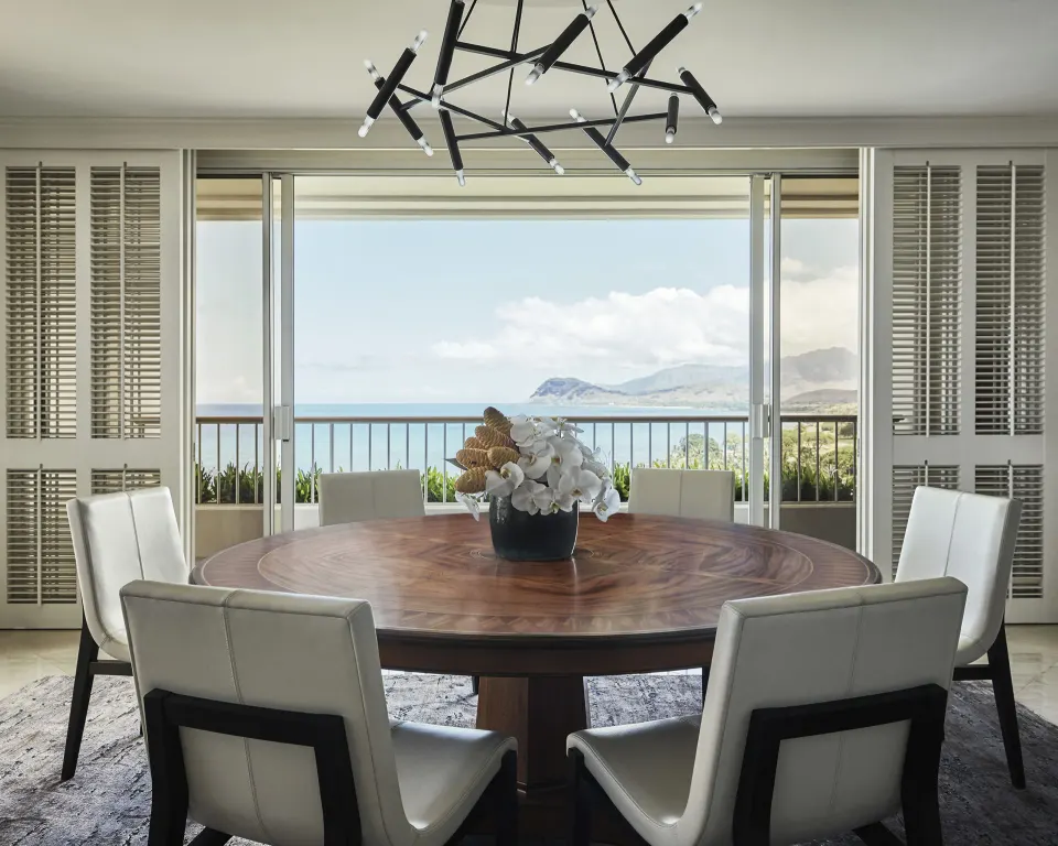 Penthouse Suite round dining table by balcony at Four Seasons Resort Oahu at Ko Olina.
