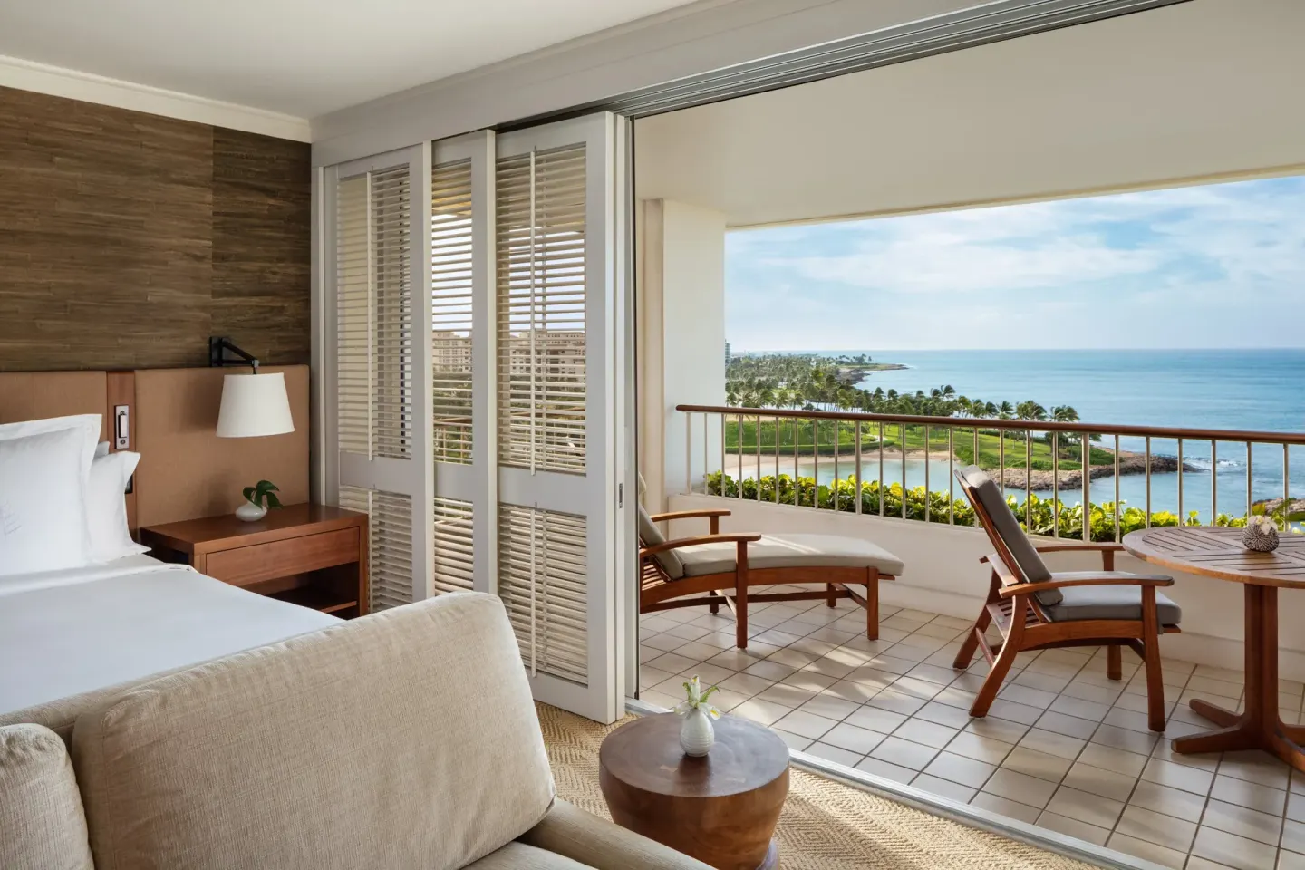 Oceanfront room with king bed and lanai at Four Seasons Resort Oahu at Ko Olina.
