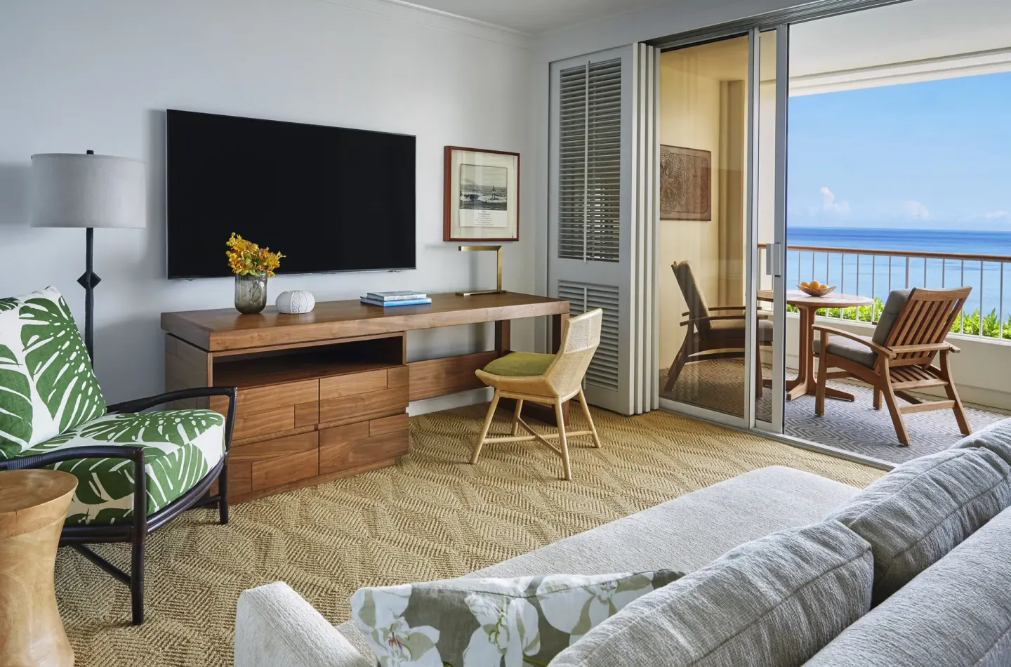 Oceanfront room sitting area and balcony at Four Seasons Resort Oahu at Ko Olina.