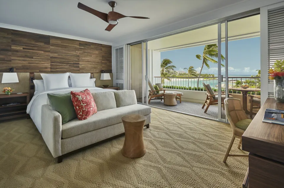 Oceanfront king room with sofa and balcony at Four Seasons Resort Oahu at Ko Olina.