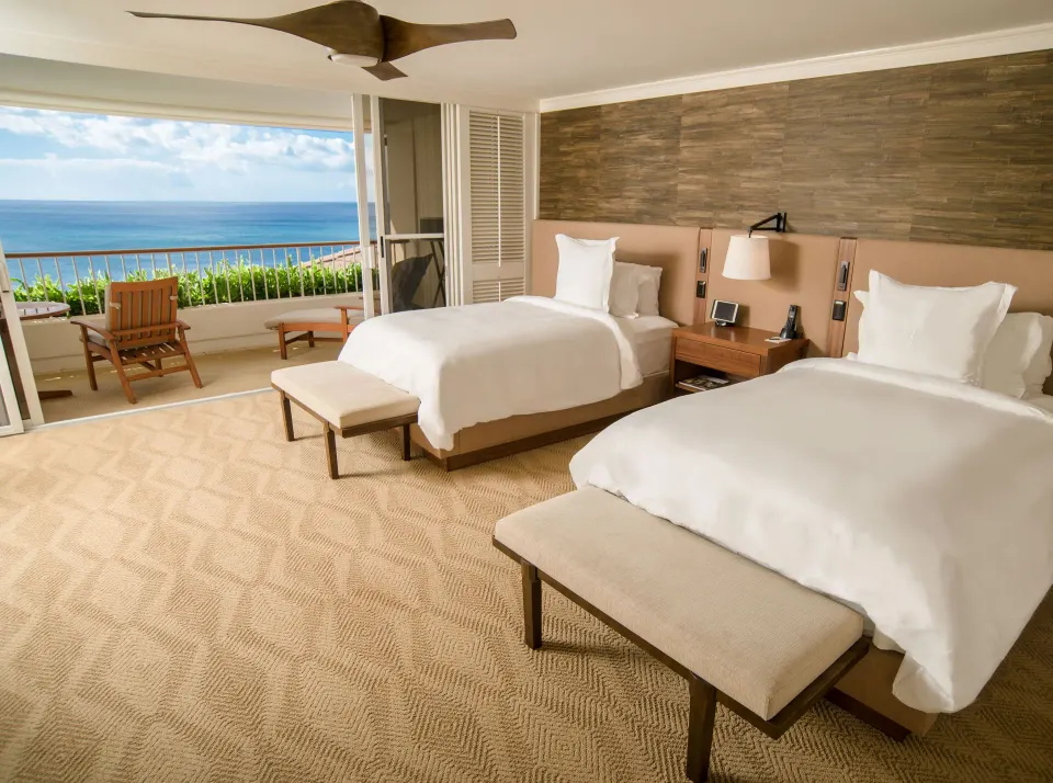 Oceanfront room with two beds and balcony at Four Seasons Resort Oahu at Ko Olina.