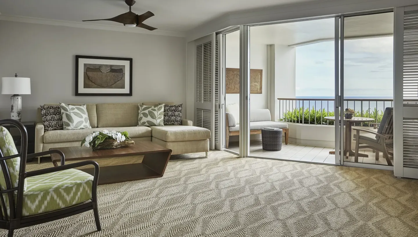 Oceanfront one-bedroom suite living room and lanai at Four Seasons Resort Oahu at Ko Olina.