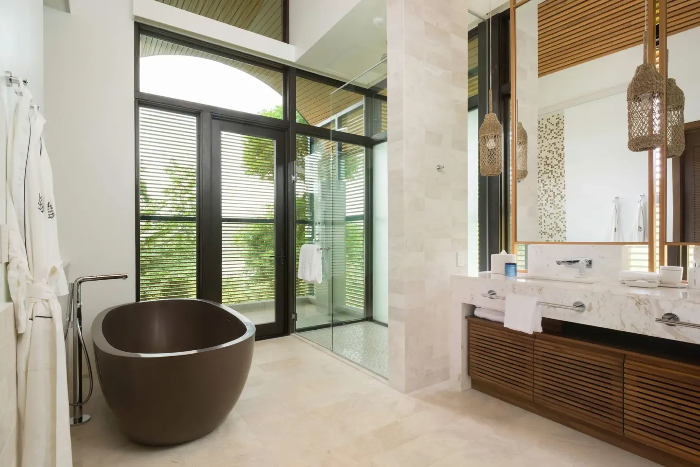 Bathroom with oval tub and double vanity at Four Seasons Resort Peninsula Papagayo, Costa Rica.